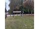 Creeks Park entrance sign and grassy area at 1604 Pine Tree Trl, Atlanta, GA 30349