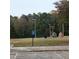 Park playground with playset and grassy area at 1604 Pine Tree Trl, Atlanta, GA 30349