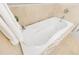 Relaxing soaking tub with tile surround and modern fixtures, creating a spa-like experience at 20 10Th Nw St # 901, Atlanta, GA 30309
