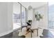 Cozy dining area with modern chandelier and floor to ceiling windows at 20 10Th Nw St # 901, Atlanta, GA 30309