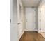 Entry hallway boasts hardwood floors, white doors, and plenty of closet space at 20 10Th Nw St # 901, Atlanta, GA 30309