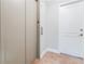Hallway features an elevator bank, marble floors, and neutral colors at 20 10Th Nw St # 901, Atlanta, GA 30309