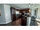 Modern kitchen with stainless steel appliances and dark wood cabinetry at 20 10Th Nw St # 901, Atlanta, GA 30309