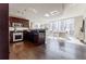 Modern kitchen and living space with stainless steel appliances and large windows at 20 10Th Nw St # 901, Atlanta, GA 30309