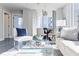Cozy living room with modern decor and dining area, all with city views at 20 10Th Nw St # 901, Atlanta, GA 30309