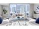 Bright and airy living room with floor to ceiling windows and modern furnishings at 20 10Th Nw St # 901, Atlanta, GA 30309