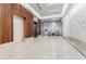 Bright lobby features modern decor, tile floors, and elevator access for residents at 20 10Th Nw St # 901, Atlanta, GA 30309