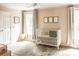 Charming Bedroom with a crib and neutral color palette at 255 Grogans Lake Pt, Atlanta, GA 30350