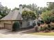 Two story home with attached garage and manicured landscaping at 255 Grogans Lake Pt, Atlanta, GA 30350