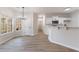 Dining area with hardwood floors and view into the kitchen at 2839 Suttonwood Way, Buford, GA 30519