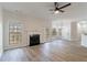 Spacious living room with fireplace and hardwood floors at 2839 Suttonwood Way, Buford, GA 30519