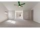 Spacious main bedroom with ceiling fan and ample sunlight at 2839 Suttonwood Way, Buford, GA 30519