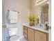 Clean bathroom with light wood cabinets and updated fixtures at 375 Highland Ave # 202, Atlanta, GA 30312