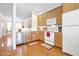 Eat-in kitchen with light wood cabinets and stainless steel appliances at 375 Highland Ave # 202, Atlanta, GA 30312