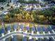 Aerial view of houses in a neighborhood with autumn trees at 419 Murphy Ave, Canton, GA 30114