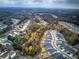 Aerial view of houses in a community with fall foliage at 419 Murphy Ave, Canton, GA 30114