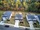 Aerial view of houses on a street with fall colors at 419 Murphy Ave, Canton, GA 30114