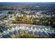 Aerial view of houses in a neighborhood with fall foliage at 419 Murphy Ave, Canton, GA 30114