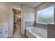 Bathroom with garden tub and walk-in shower at 419 Murphy Ave, Canton, GA 30114