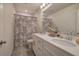 Modern bathroom with white cabinets and double vanity at 419 Murphy Ave, Canton, GA 30114