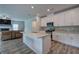 Modern kitchen with white cabinets and granite countertops at 419 Murphy Ave, Canton, GA 30114