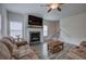 Bright living room with hardwood floors, fireplace, and plenty of natural light at 419 Murphy Ave, Canton, GA 30114