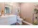 Modern powder room with white vanity and neutral decor at 3325 Piedmont Ne Rd # 2904, Atlanta, GA 30305