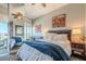 Comfortable guest bedroom with city views and built-in seating at 3325 Piedmont Ne Rd # 2904, Atlanta, GA 30305