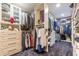 Large walk-in closet with custom built-ins and ample shelving at 3325 Piedmont Ne Rd # 2904, Atlanta, GA 30305