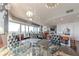 Elegant dining area with a glass table and city views at 3325 Piedmont Ne Rd # 2904, Atlanta, GA 30305