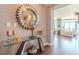 Elegant entryway with glass console table and mirror at 3325 Piedmont Ne Rd # 2904, Atlanta, GA 30305