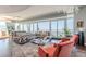 Spacious living room with city views and modern furniture at 3325 Piedmont Ne Rd # 2904, Atlanta, GA 30305