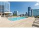 Stunning rooftop pool with city views and lounge area at 3325 Piedmont Ne Rd # 2904, Atlanta, GA 30305