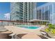 Spacious rooftop pool with city views and lounge chairs at 3325 Piedmont Ne Rd # 2904, Atlanta, GA 30305