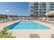 Inviting rooftop pool with city views and lounge chairs at 3325 Piedmont Ne Rd # 2904, Atlanta, GA 30305