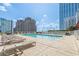 Rooftop pool with city views and lounge chairs at 3325 Piedmont Ne Rd # 2904, Atlanta, GA 30305