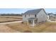 Private backyard with a view of neighboring homes at 13958 Conrad Court Ln, Covington, GA 30014