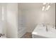 Double vanity bathroom with a shower/tub combo at 13958 Conrad Court Ln, Covington, GA 30014