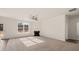 Spacious living room with a cozy fireplace at 13958 Conrad Court Ln, Covington, GA 30014