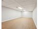 Spacious finished basement with new flooring at 680 Branch Valley Ct, Roswell, GA 30076