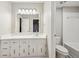 Clean bathroom with white vanity and bathtub at 680 Branch Valley Ct, Roswell, GA 30076