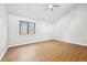 Bright bedroom with vaulted ceiling and wood floors at 680 Branch Valley Ct, Roswell, GA 30076