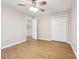 Spacious bedroom with ceiling fan and access to upper hallway at 680 Branch Valley Ct, Roswell, GA 30076