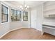 Breakfast nook with built-in shelving and window seat at 680 Branch Valley Ct, Roswell, GA 30076