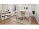 Modern dining room with hardwood floors and stylish furniture at 680 Branch Valley Ct, Roswell, GA 30076