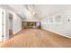 Bright living room with hardwood floors, vaulted ceiling and a stone fireplace at 680 Branch Valley Ct, Roswell, GA 30076