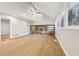 Spacious living room featuring a stone fireplace and built-in shelving at 680 Branch Valley Ct, Roswell, GA 30076
