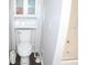 Toilet and small cabinet in a bathroom at 100 Meadow Lake Dr, Carrollton, GA 30116