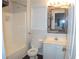 Bathroom with white vanity and tub at 100 Meadow Lake Dr, Carrollton, GA 30116