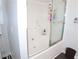 Small bathroom with shower and tub at 100 Meadow Lake Dr, Carrollton, GA 30116